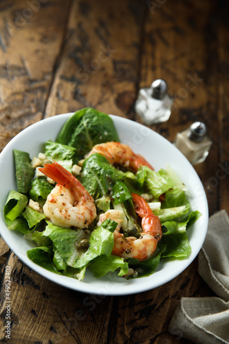 Homemade Caesar salad with shrimps