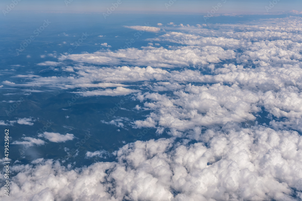 Blue sky background with big white striped clouds. blue sky panorama may use for sky replacement Blue sky background with big white striped clouds. blue sky panorama may use for sky replacement