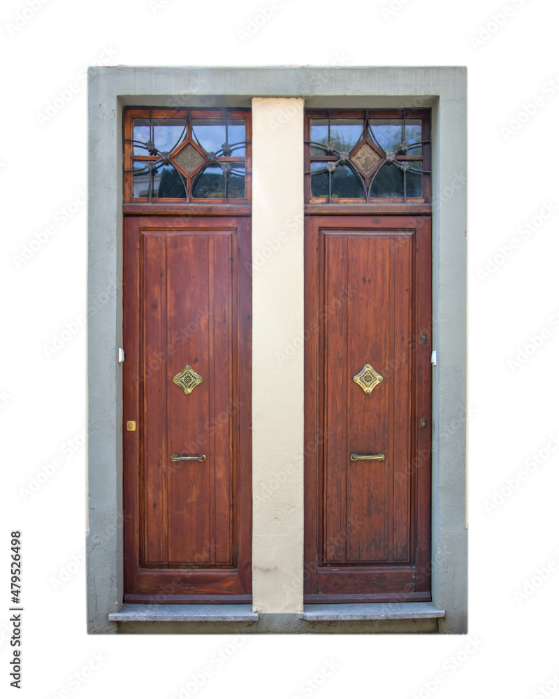 Double entrance front doors isolated on white. Colorful classic ancient wooden streetdoor with windows in the wall.