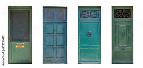 Green entrance front door isolated on white. Colorful classic ancient wooden streetdoor with windows.