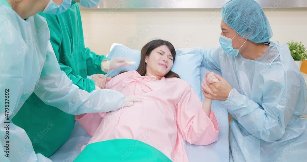 pregnant woman in delivery room pregnant woman in delivery room