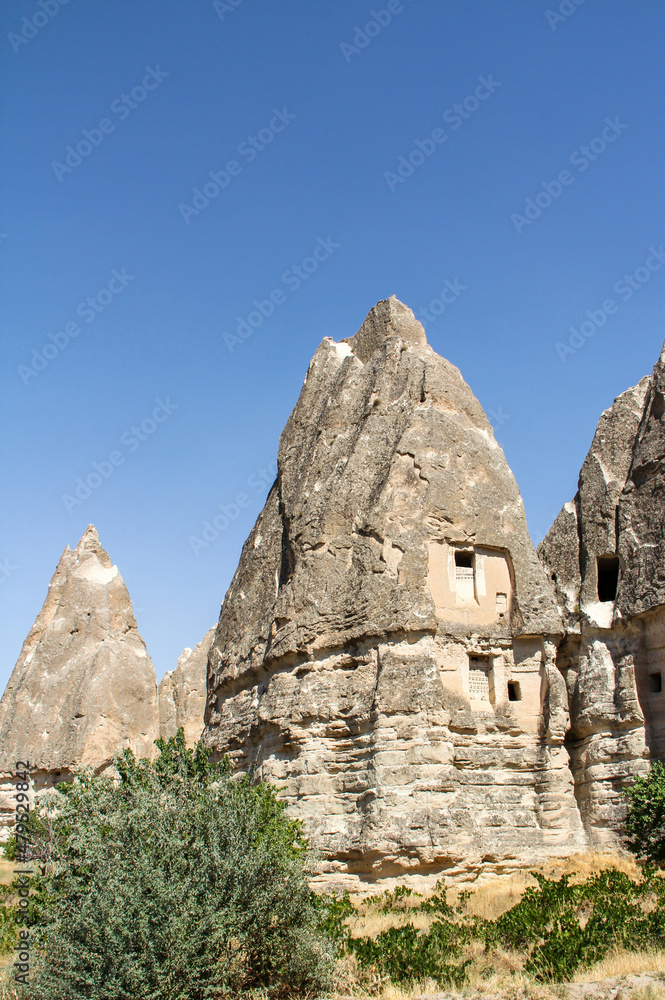 Fairy chimneys near Cavusin Town in Cappadocia