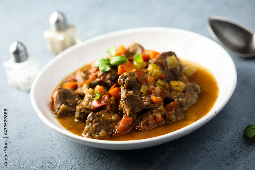 Beef ragout with vegetables and basil