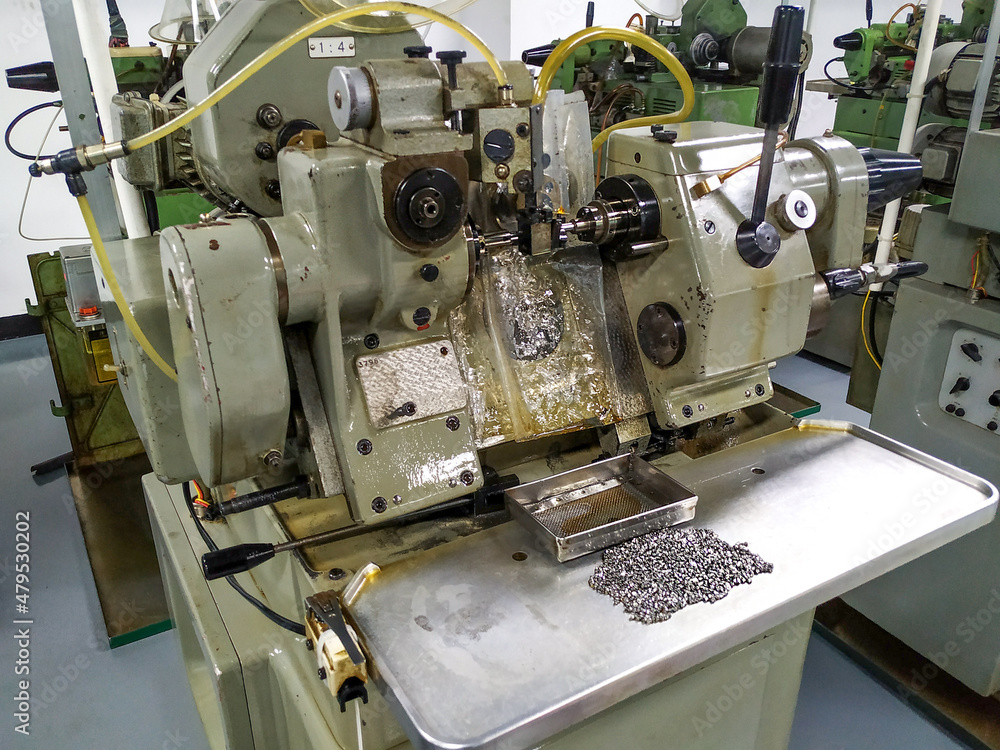 A series of lathes for watchmaking at a factory in China. Production of parts at the production site. Workshop, site A series of lathes for watchmaking at a factory in China. Production of parts at the production site. Workshop, site
