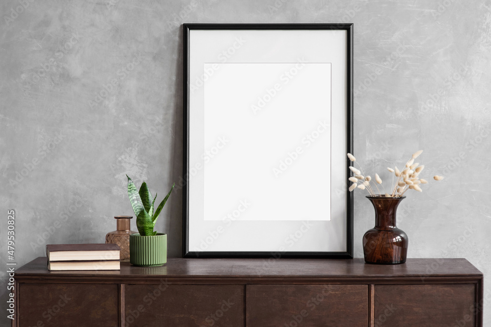 Blank picture frame mockup on gray wall. Modern living room design. View of modern scandinavian style interior. Home staging and minimalism concept