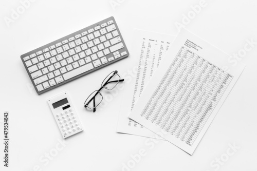 Taxes accounting on office table with calculator,top view © 9dreamstudio