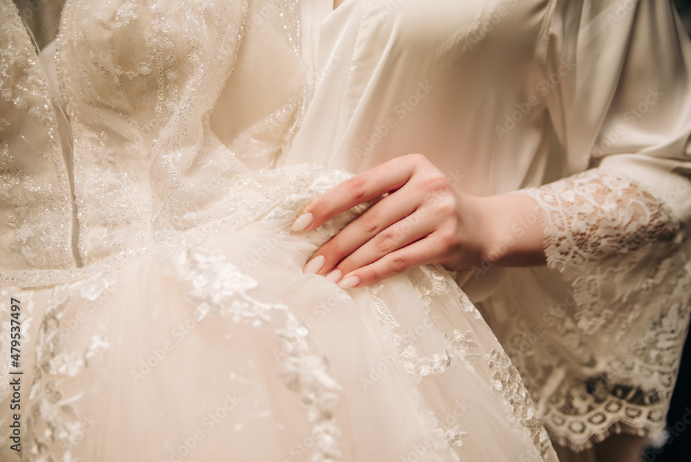 Hand with beautiful nails on lace background Hand with beautiful nails on lace background