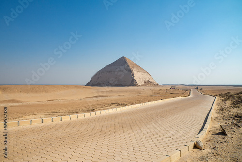 The Pyramid of Bent  also known as the False  or Rhomboidal Pyramid because the angular slope changed  of Pharaoh Sneferu with a well-preserved original limestone casing. Egypt. Dahshur  or Dashur .