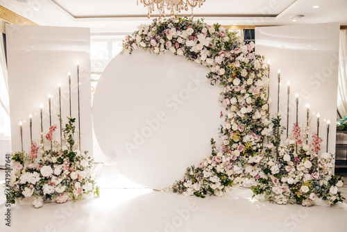 White floral backdrop for photo shoots with purple flowers 