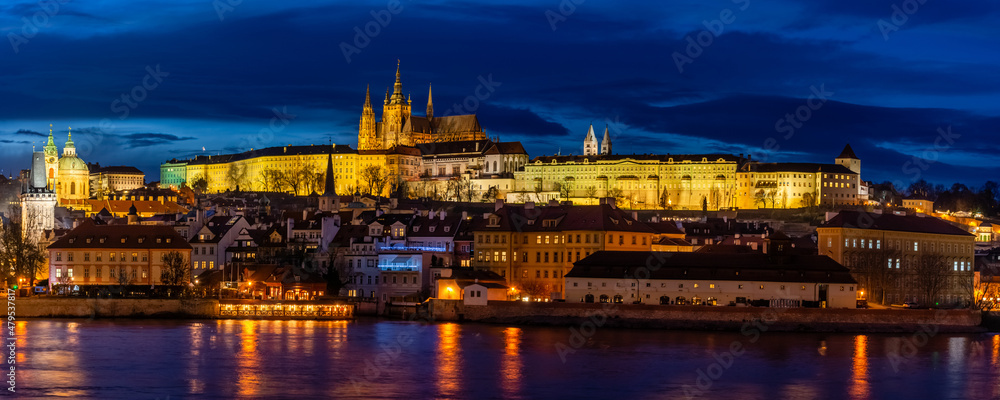 Evening Prague, view of the Vitus Cathedral against the blue sky, panoramic shot