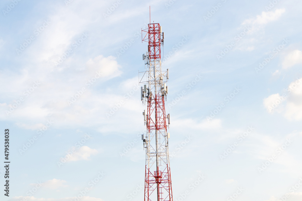 Signal tower Telecommunication modern technology with 5G,4G cellular network tower or Antenna of Communication Building on city and on white sky cloud background. Modern internet signal technology. Signal tower Telecommunication modern technology with 5G,4G cellular network tower or Antenna of Communication Building on city and on white sky cloud background. Modern internet signal technology.