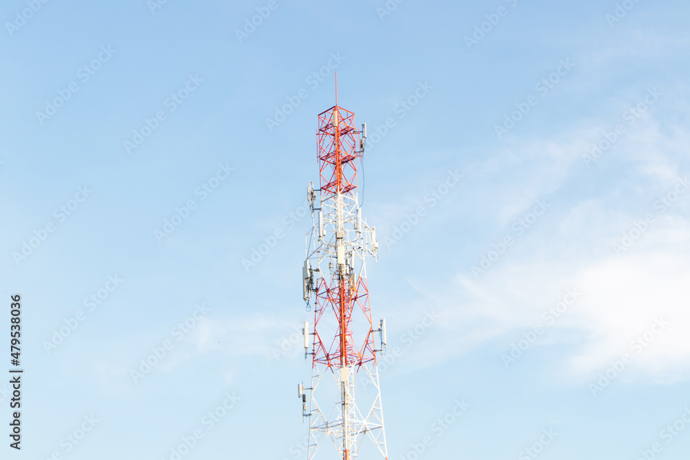 Signal tower Telecommunication modern technology with 5G,4G cellular network tower or Antenna of Communication Building on city and on white sky cloud background. Modern internet signal technology. Signal tower Telecommunication modern technology with 5G,4G cellular network tower or Antenna of Communication Building on city and on white sky cloud background. Modern internet signal technology.