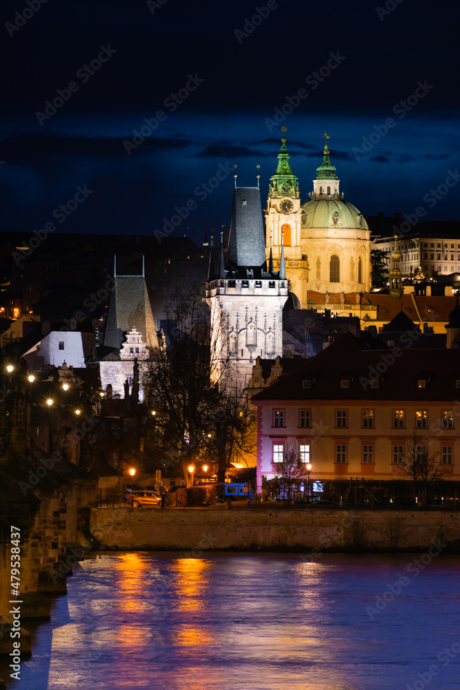 Fototapeta premium Evening Prague, view of the old town, reflection of the lights of the night city
