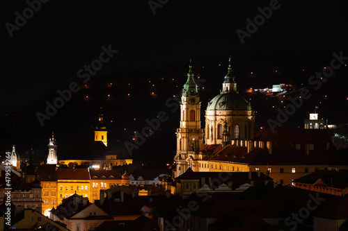 Prague at night, view of the Basilica of St. Mikulas, cityscape