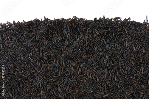 uncooked wild black rice isolated on white background