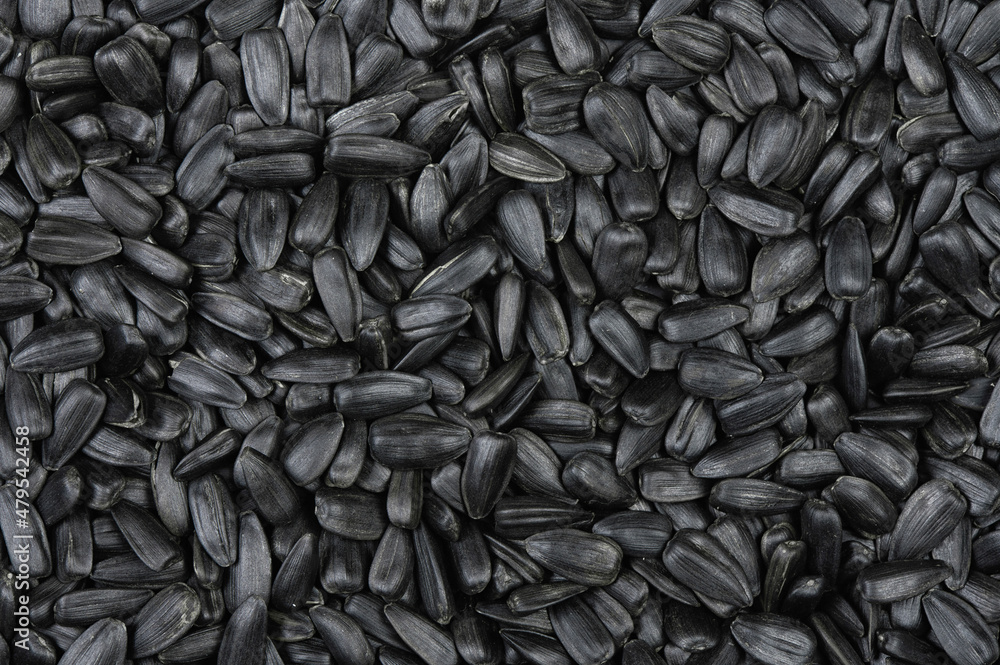 Black sunflower seeds texture and background Black sunflower seeds texture and background