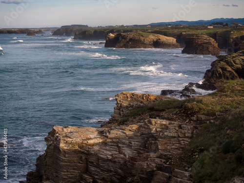 Las Catedrales beach, Ribadeo, Galicia, Spain. Vertical view of coastline and Las Catedrales beach in the background.