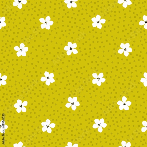 Beautiful vintage pattern. White flowers, mustard dots. Yellow background. Floral seamless background. An elegant template for fashionable prints.
