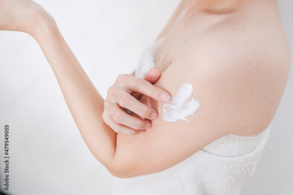 Woman applying cream,lotion on arm with white background, Beauty concept. Woman applying cream,lotion on arm with white background, Beauty concept.