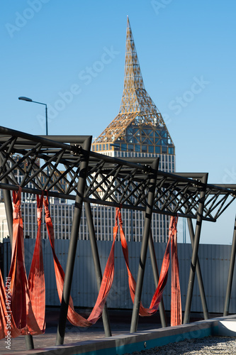 swing hammocks on the background of modern buildings. recreation area 