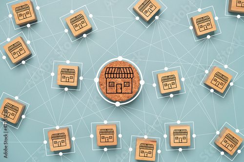 Fotografi Business sale growth and expand shop franchise concept, Store illustration print screen on wooden cube block connection link with others shop and supermarket