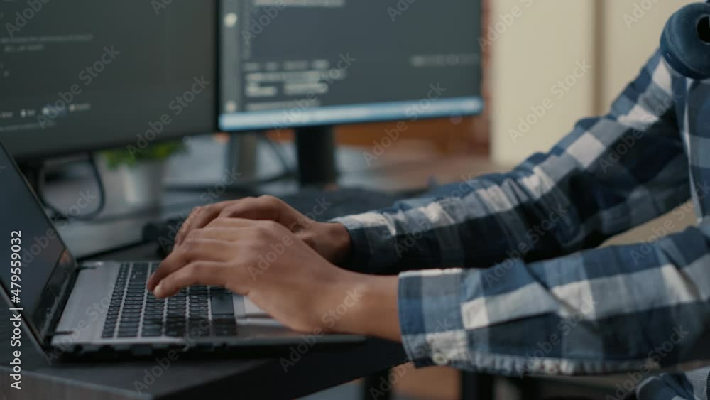 Closeup of programer hands typing machine learning code on laptop ...