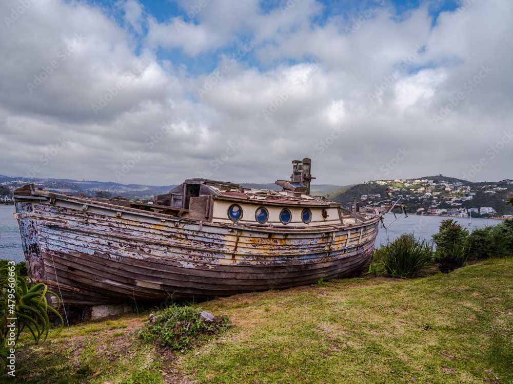 Rustic wooden boat in the Knysna in garden route South Africa Rustic wooden boat in the Knysna in garden route South Africa