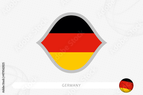 Germany flag for basketball competition on gray basketball background.