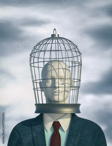 Businessman with a bird cage head. photo