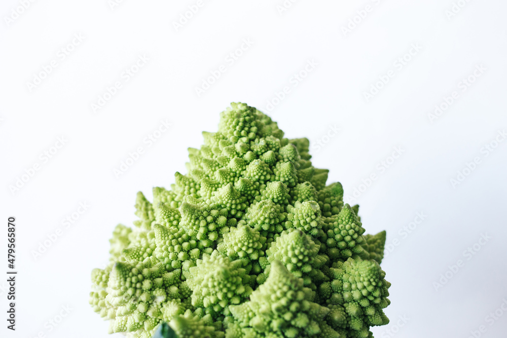 fresh green cabbage romanesco on a white background fresh green cabbage romanesco on a white background