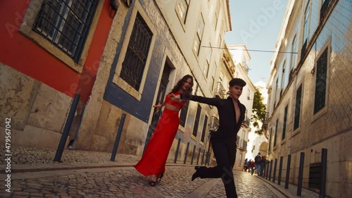 Beautiful Couple Dancing a Latin Dance on the Quiet Street of an Old Town in a City. Sensual Dance by Two Professional Dancers on a Sunny Day Outside in Ancient Culturally Rich Tourist Location.