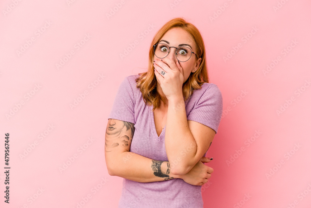 Young caucasian woman isolated on pink background scared and afraid. Young caucasian woman isolated on pink background scared and afraid.