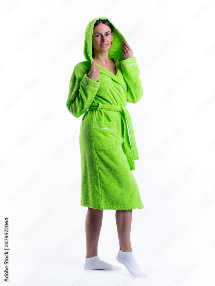 woman in a Bathrobe on an isolated white background with a smile on her face. woman in a Bathrobe on an isolated white background with a smile on her face.