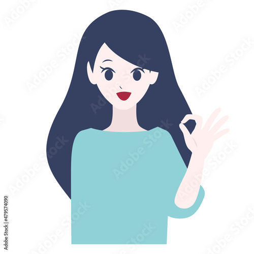 手でOKのサインをする女性