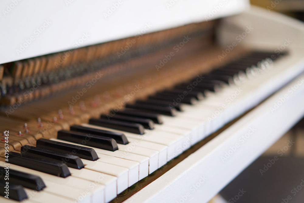 Old Piano, keyboard keys shot across the piano keys
