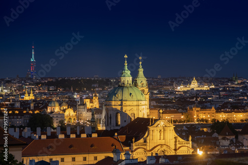 Prague city evening landscape scenery, Postcard look above city building with dome in old town.
