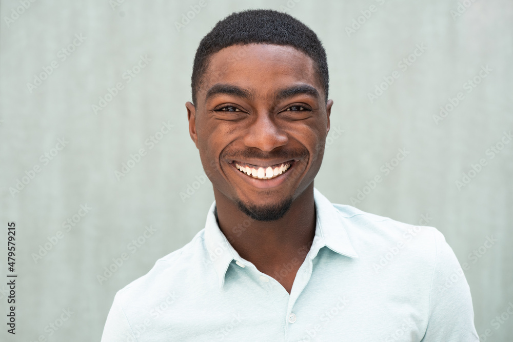 Close up front of smiling African American young man Close up front of smiling African American young man
