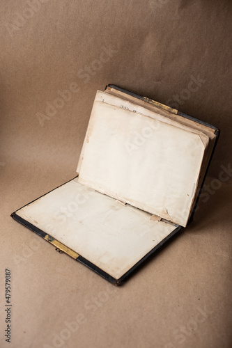 Open old book on the shelf