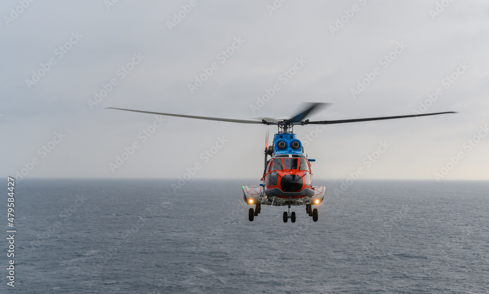 The civil helicopter over the sea The civil helicopter over the sea