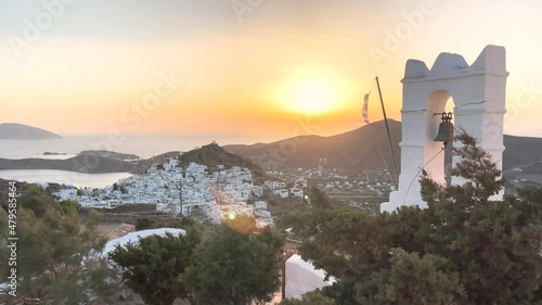 Ios Greece, beautiful sunset on the cycladic island, panoramic view from the church to the old town Chora