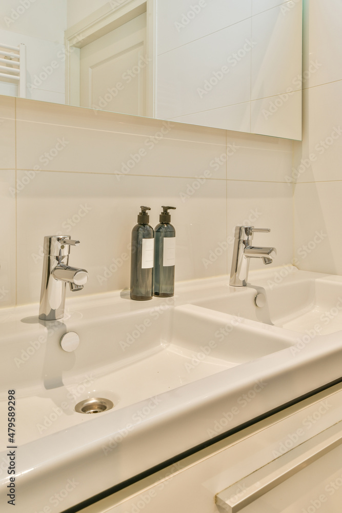Modern bathroom interior with sink under mirror Modern bathroom interior with sink under mirror