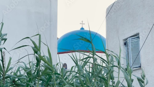 blue dome of greek church close up, street of old city Greece