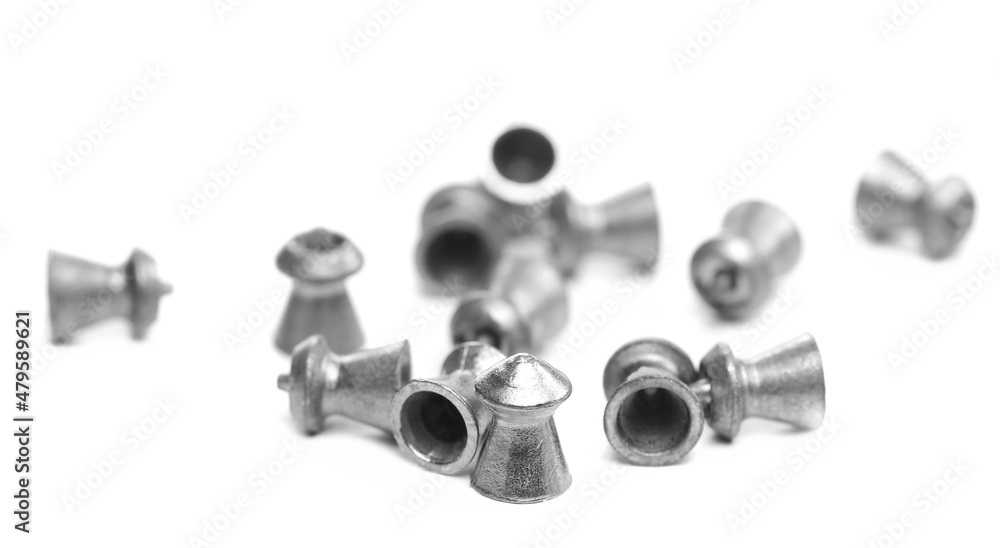 Pile lead pellets for air rifle isolated on white Pile lead pellets for air rifle isolated on white