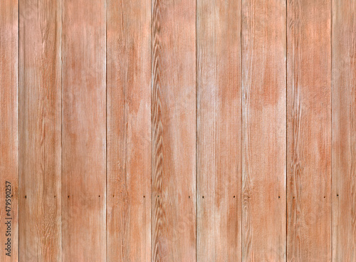 Vertical wood wall pattern - a light seamless background pattern. Image is ready to be tiled to create a much larger image or higher resolution background.
