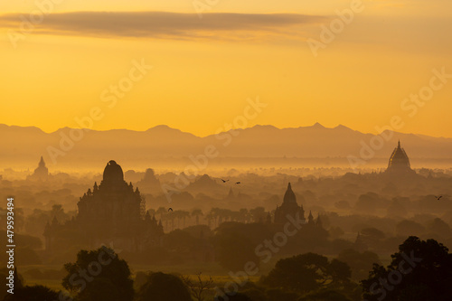 group of ancient pagodas in Bagan at the sunset, myanmar