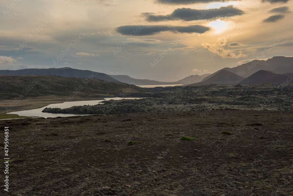 Volcanic landscape with river in Iceland in sunset