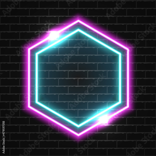 Futuristic Neon polygon frame border on dark wall.