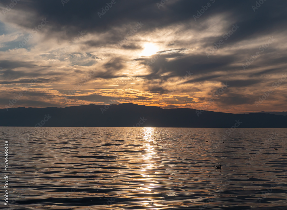 Fototapeta premium Beautiful calm lake with sunset