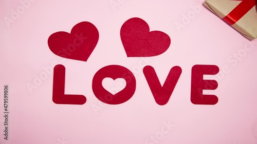 Red letters line up the inscription 