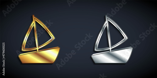 Gold and silver Yacht sailboat or sailing ship icon isolated on black background. Sail boat marine cruise travel. Long shadow style. Vector